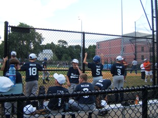 The Medford All-Stars hang out between innings
