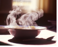 A steaming bowl of soup