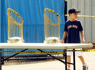Young Sox fan approaches trophies