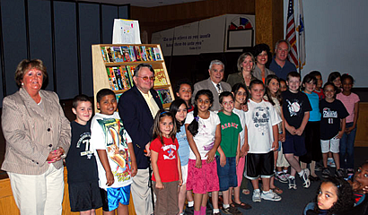 Kiwanis donate books to McGlynn Elementary School