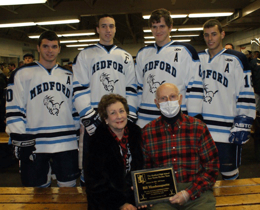MHS Hockey captains and Monbo