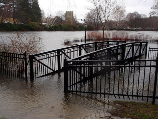 A submerged sidewalk in Winchester