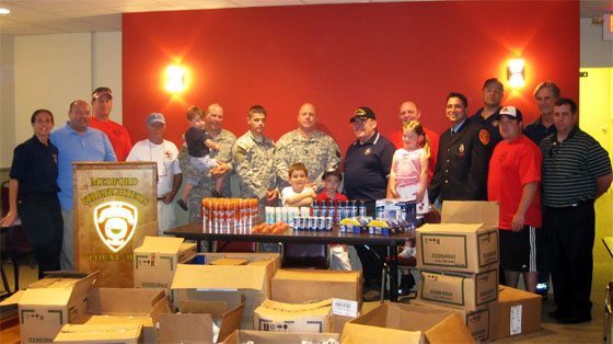Medford firefighters send packages to troops