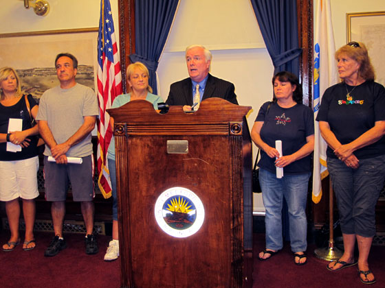 Mayor Michael McGlynn and union officials