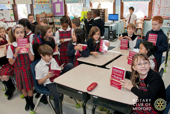 St. Joseph's students with dictionaries