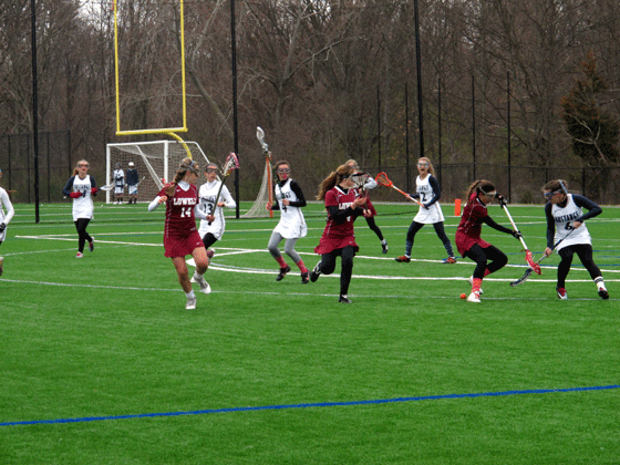 girls lacrosse team vs Lowell