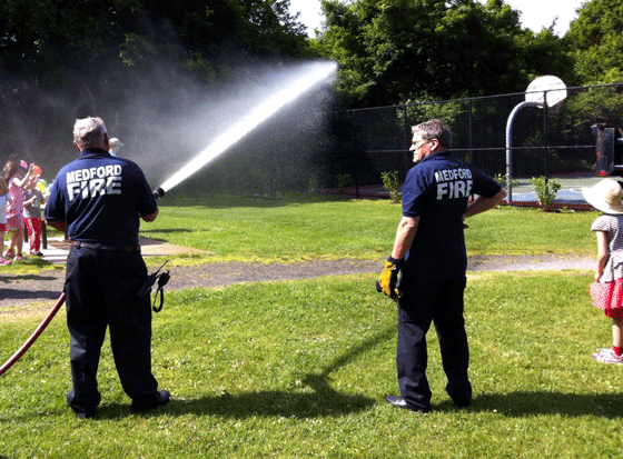 Firefighters water new plants