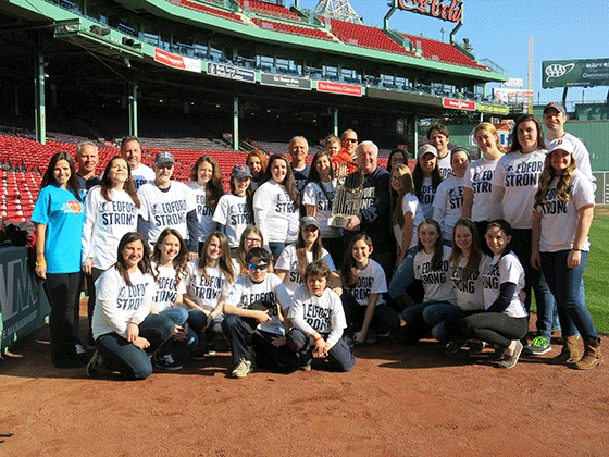 softball team at Fenway Park