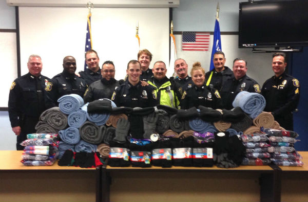 MPD members with clothing donation